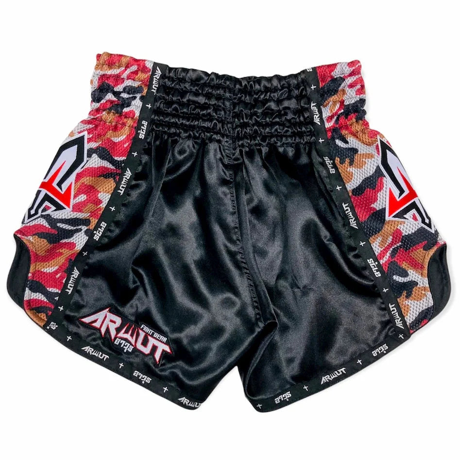 Black Muay Thai shorts with colorful side panels and brand logo on a white background