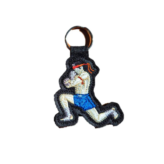 Embroidered keychain of a Muay Thai Fighter character on a white background