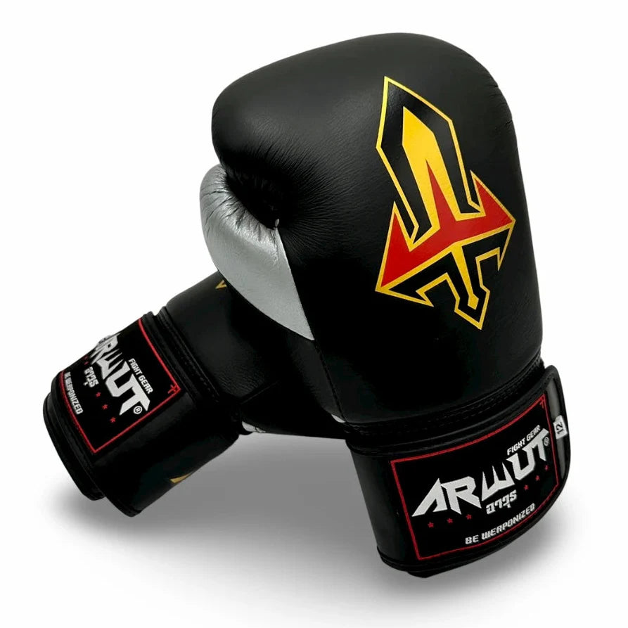 Black and silver boxing glove with a red and yellow logo on a white background