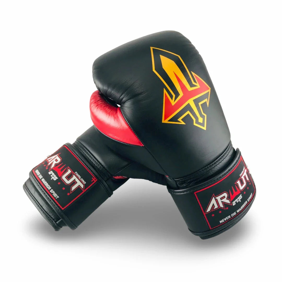 Black boxing glove with red accents and a prominent logo on a white background
