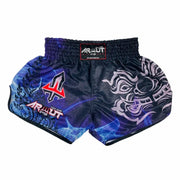 Black and blue Muay Thai shorts with a brand logo on a white background