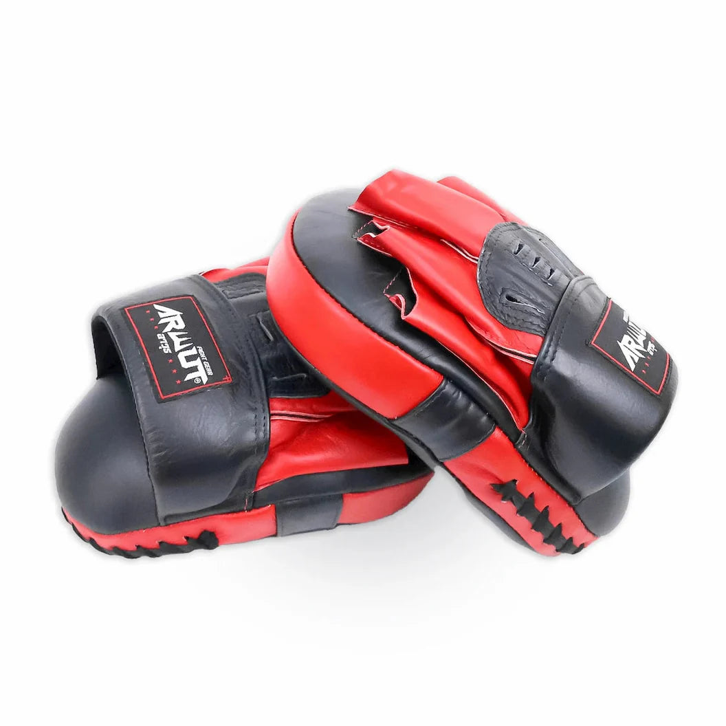 Black and red boxing mitts on a white background