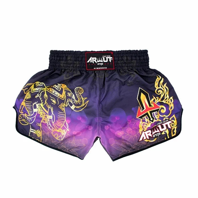 Purple and gold Muay Thai shorts with brand logo on a white background