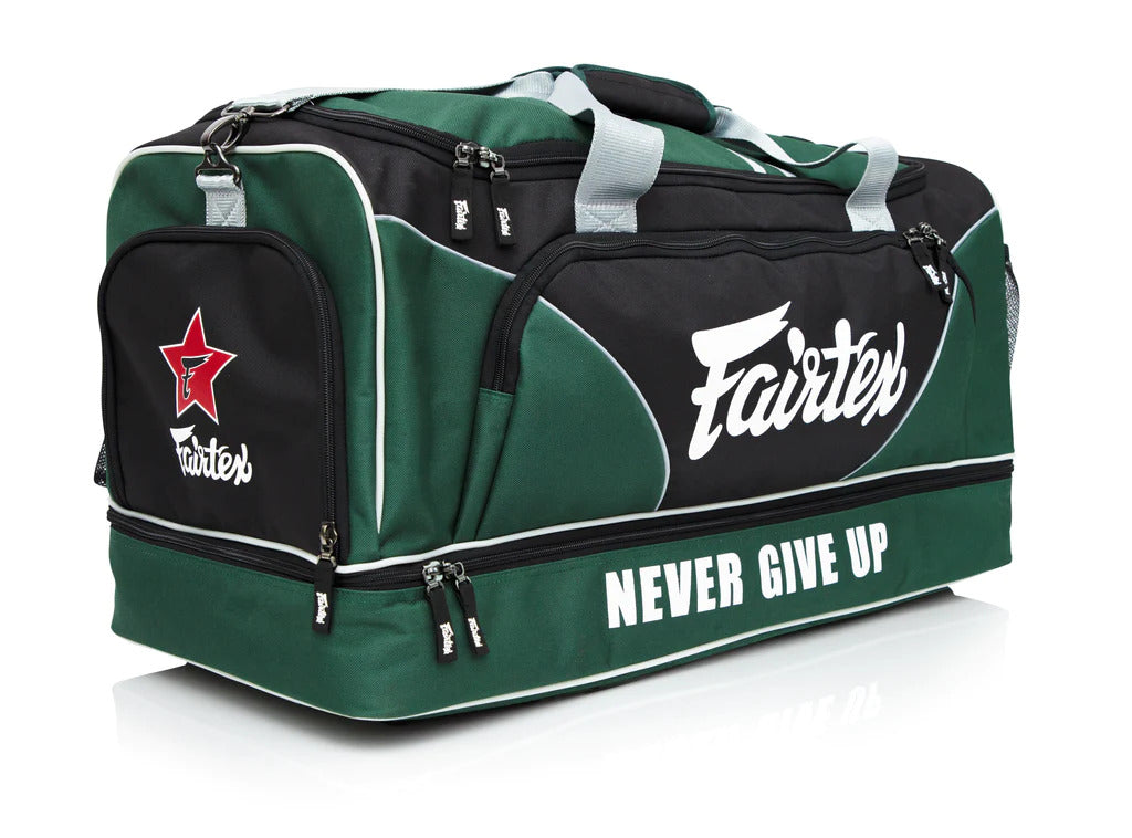 Green and black sports bag with 'Fairtex' branding and 'Never Give Up' slogan on a white background