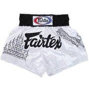 White Muay Thai shorts with black Fairtex logo on a white background