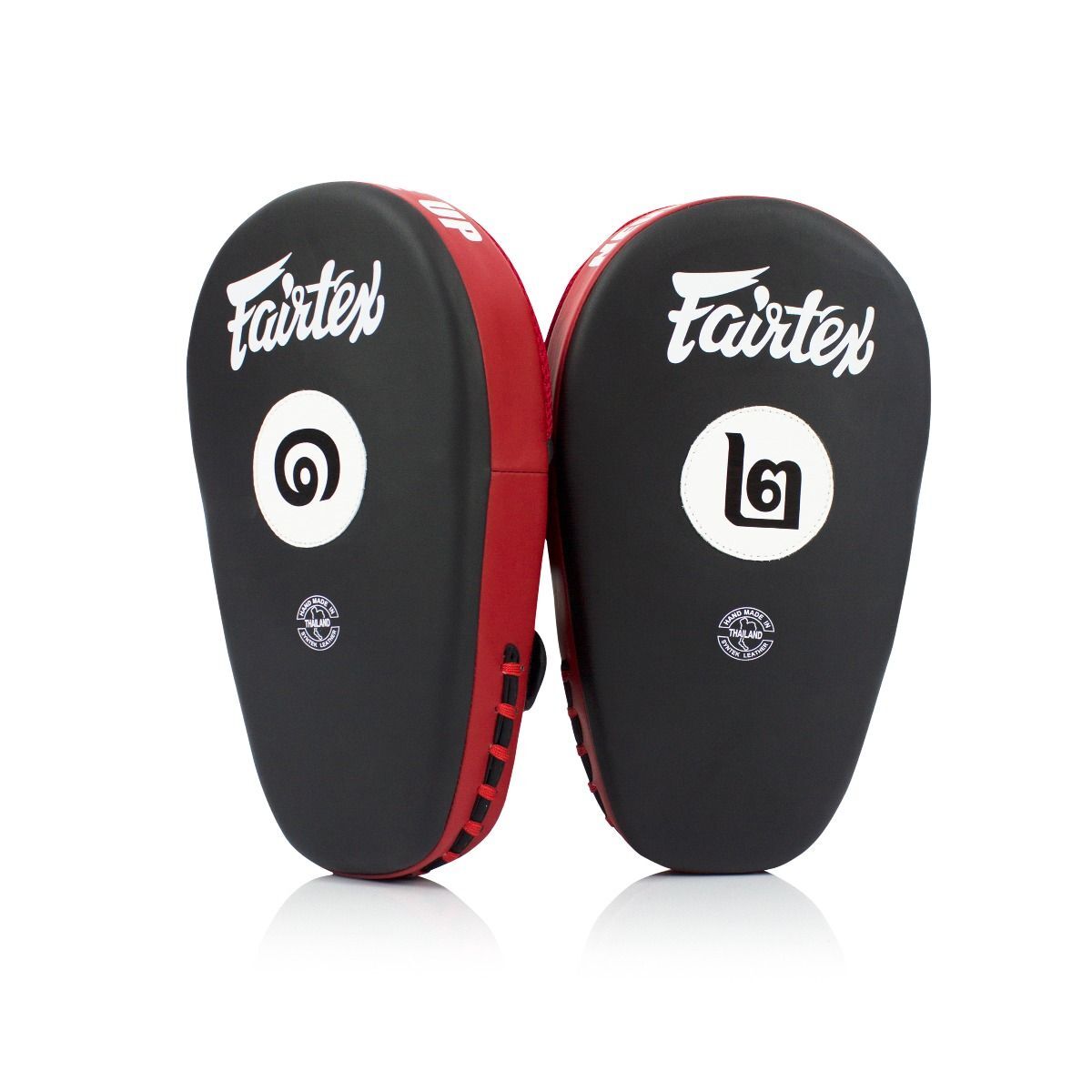 Pair of black and red Fairtex Thai pads on a white background
