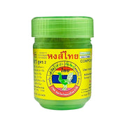 Green liniment oil jar with yellow label on a white background