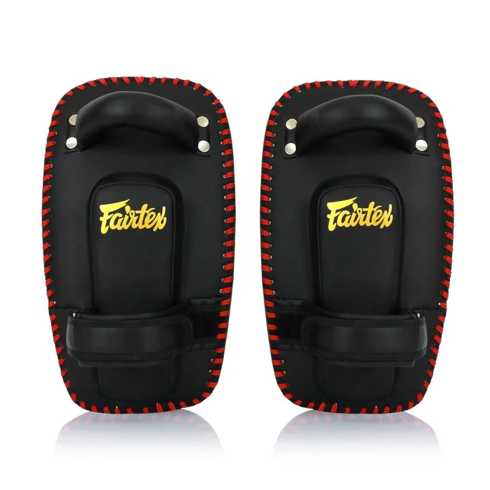 Pair of black and red Fairtex Muay Thai pads on a white background