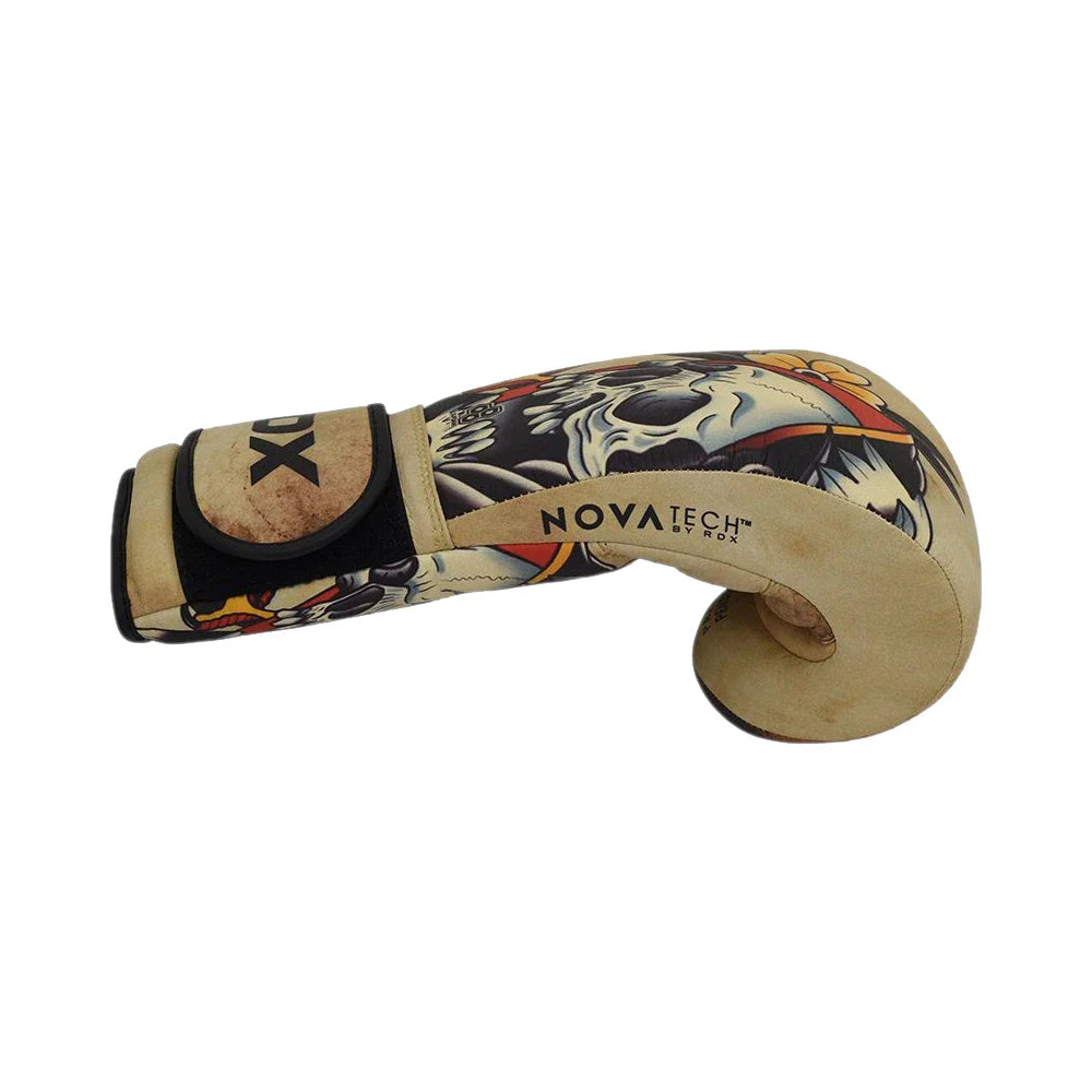 Decorative RDX boxing glove with tattoo design on a white background