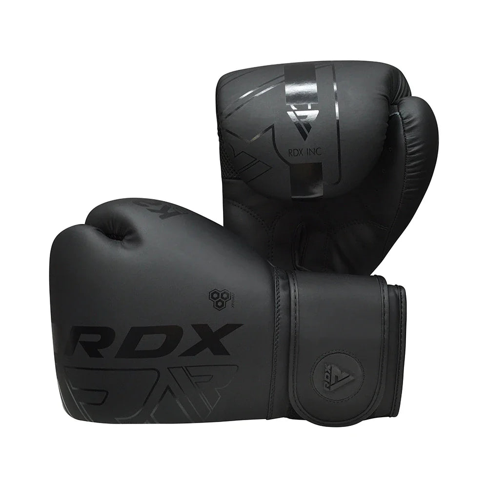 Black boxing gloves with RDX branding on a white background