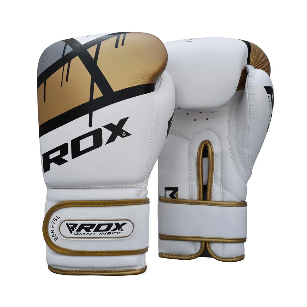 White boxing gloves with gold and black accents featuring RDX branding on a white background.