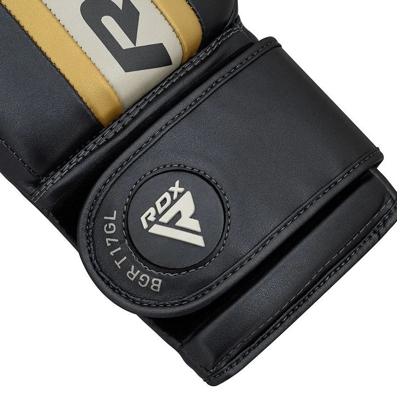 Black boxing glove wrist compartment with RDX logo on a white background