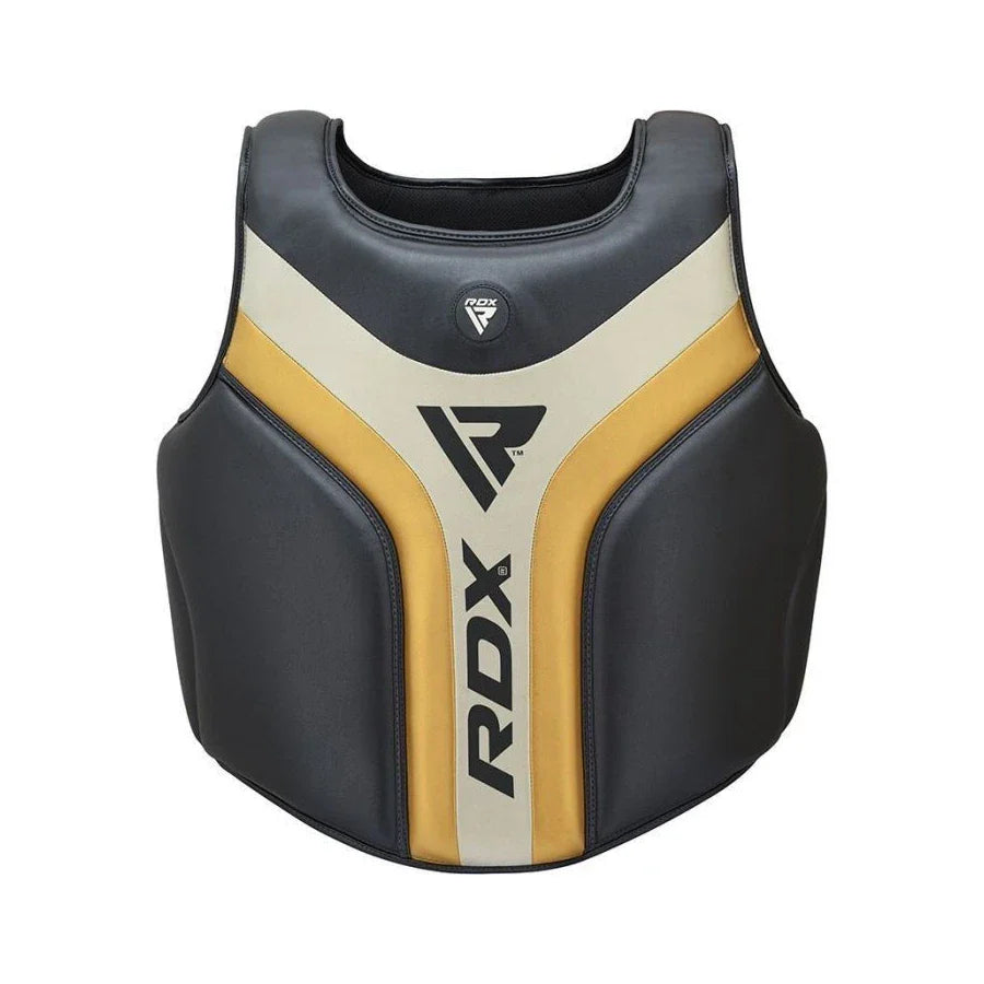 Black and gold RDX protective vest on a white background