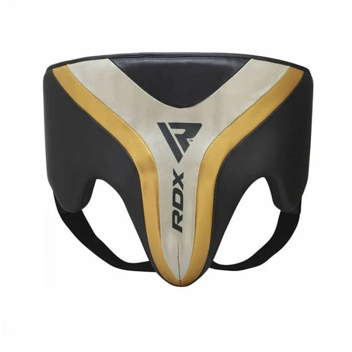 RDX groin guard with black, gold, and white design on a white background