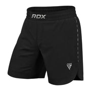 Black athletic MMA shorts with RDX branding on a white background