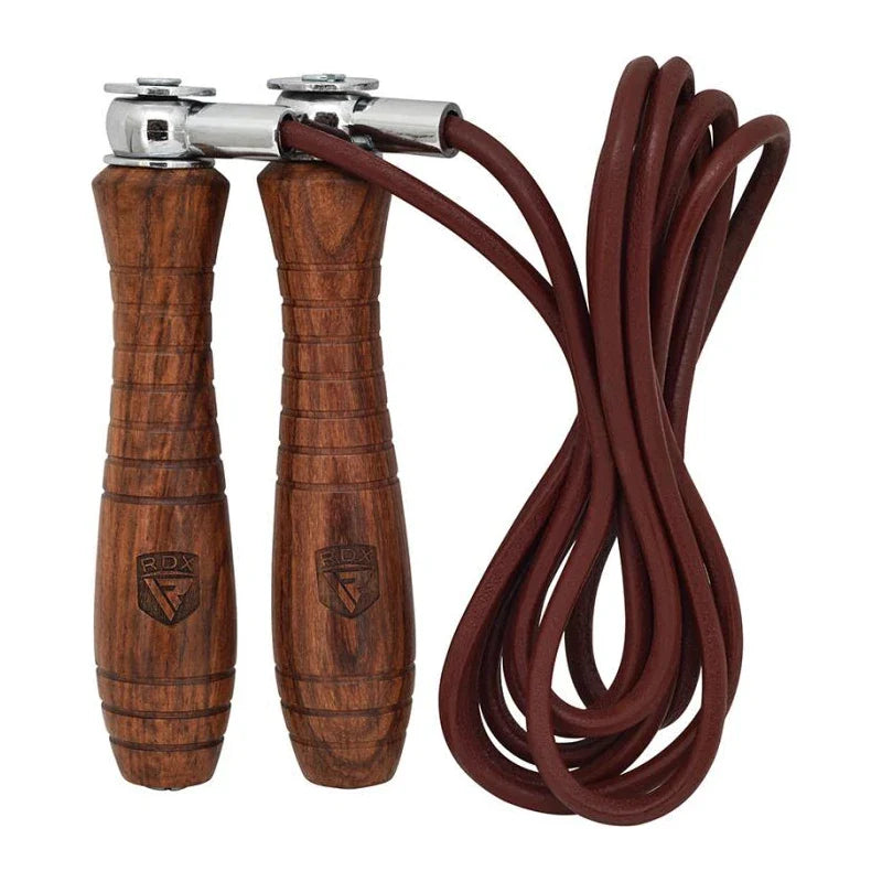 Wooden RDX jump rope with metal clamps on a white background
