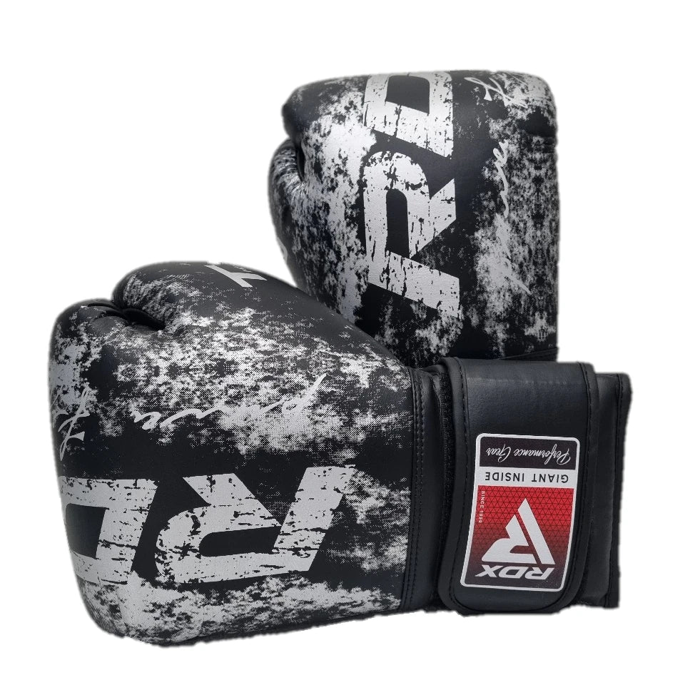 Pair of black and gray boxing gloves with RDX logo on a white background