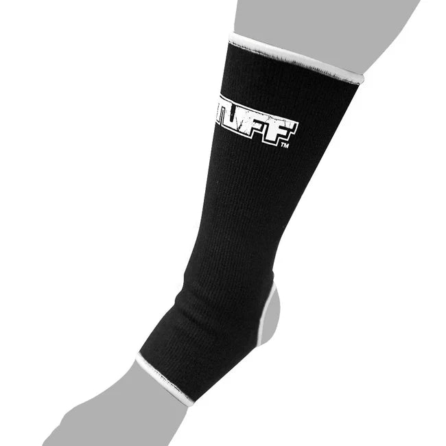 Black anklets with a brand logo on a gray background