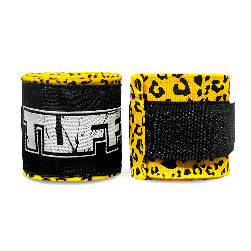 Pair of wrist wraps with leopard print and black accents on a white background