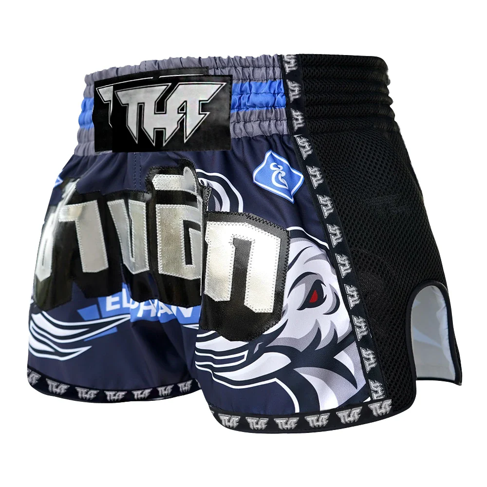 Muay Thai shorts with branding and design on a white background