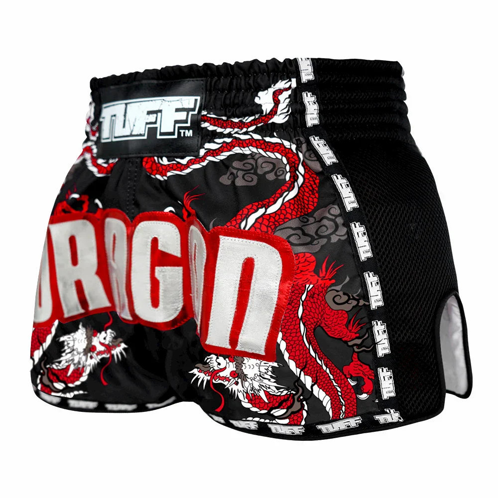 Black Muay Thai shorts with red and white dragon design and TUFF logo on a white background