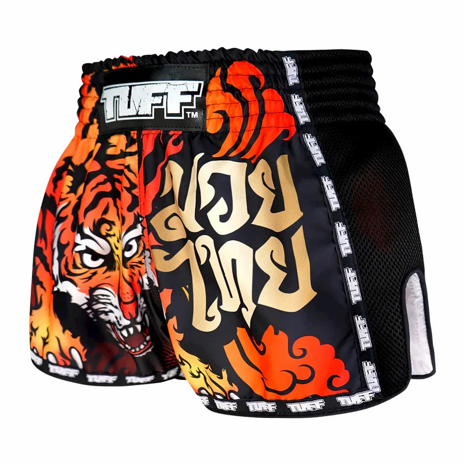 Tiger-themed Muay Thai shorts with orange and black design on a white background