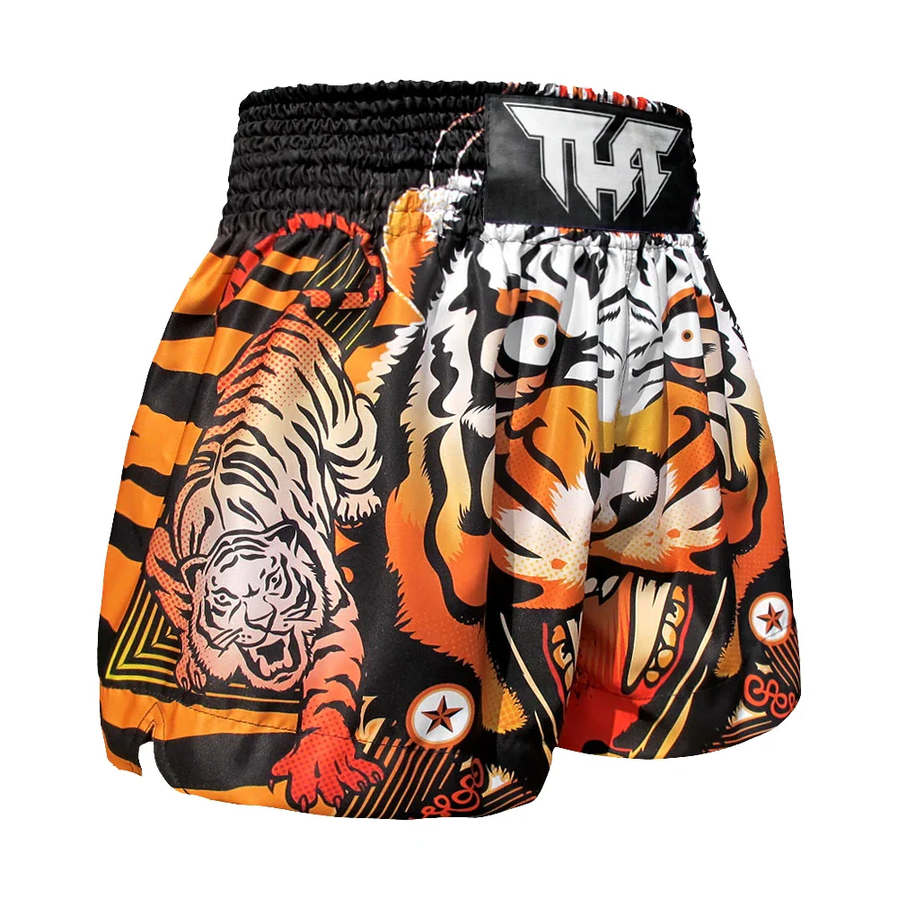 Muay Thai shorts with tiger design and Tuff branding on a white background