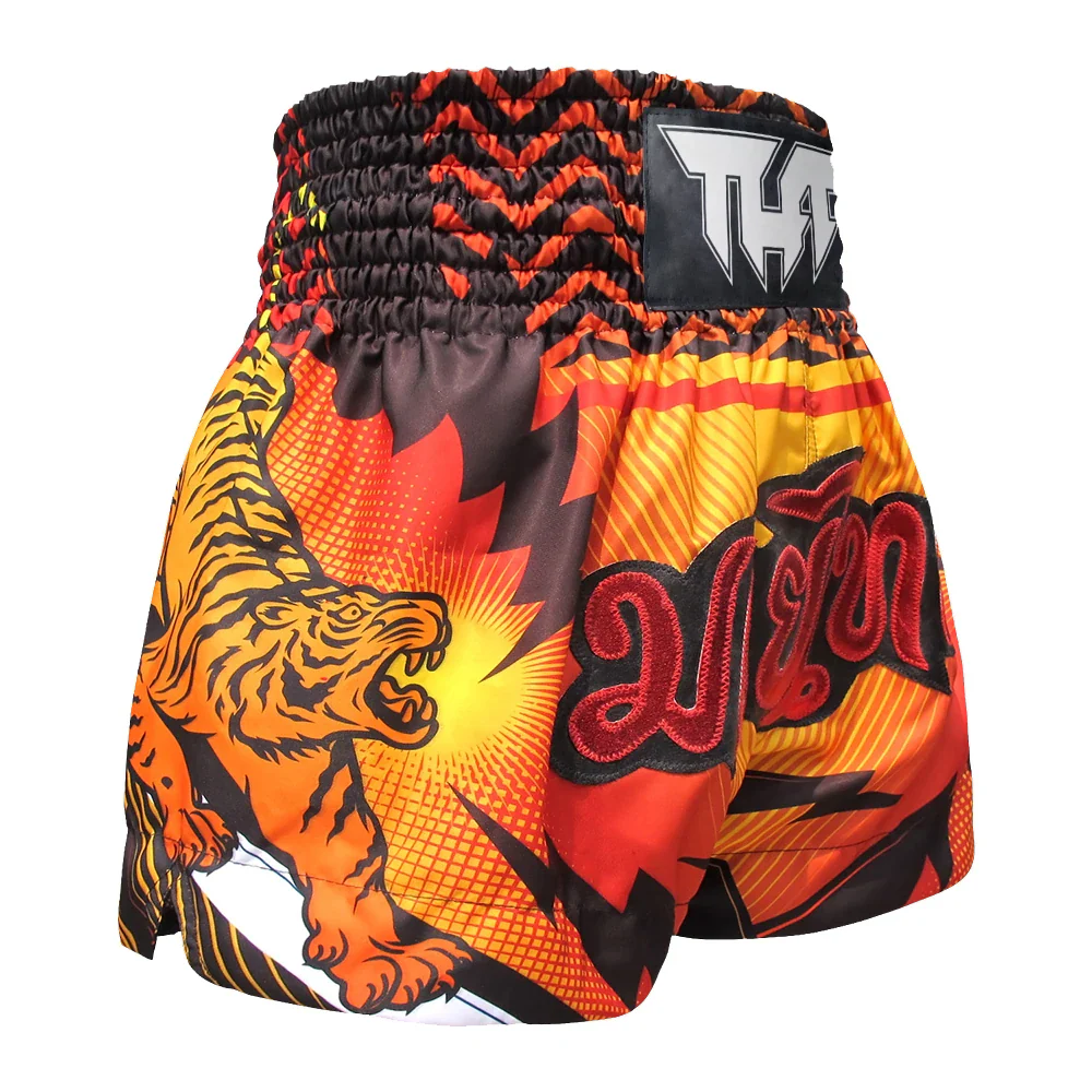 Colorful Muay Thai shorts with a tiger design on a white background