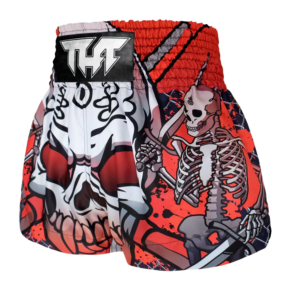 Muay Thai boxing shorts with skeleton design and Tuff branding on a white background