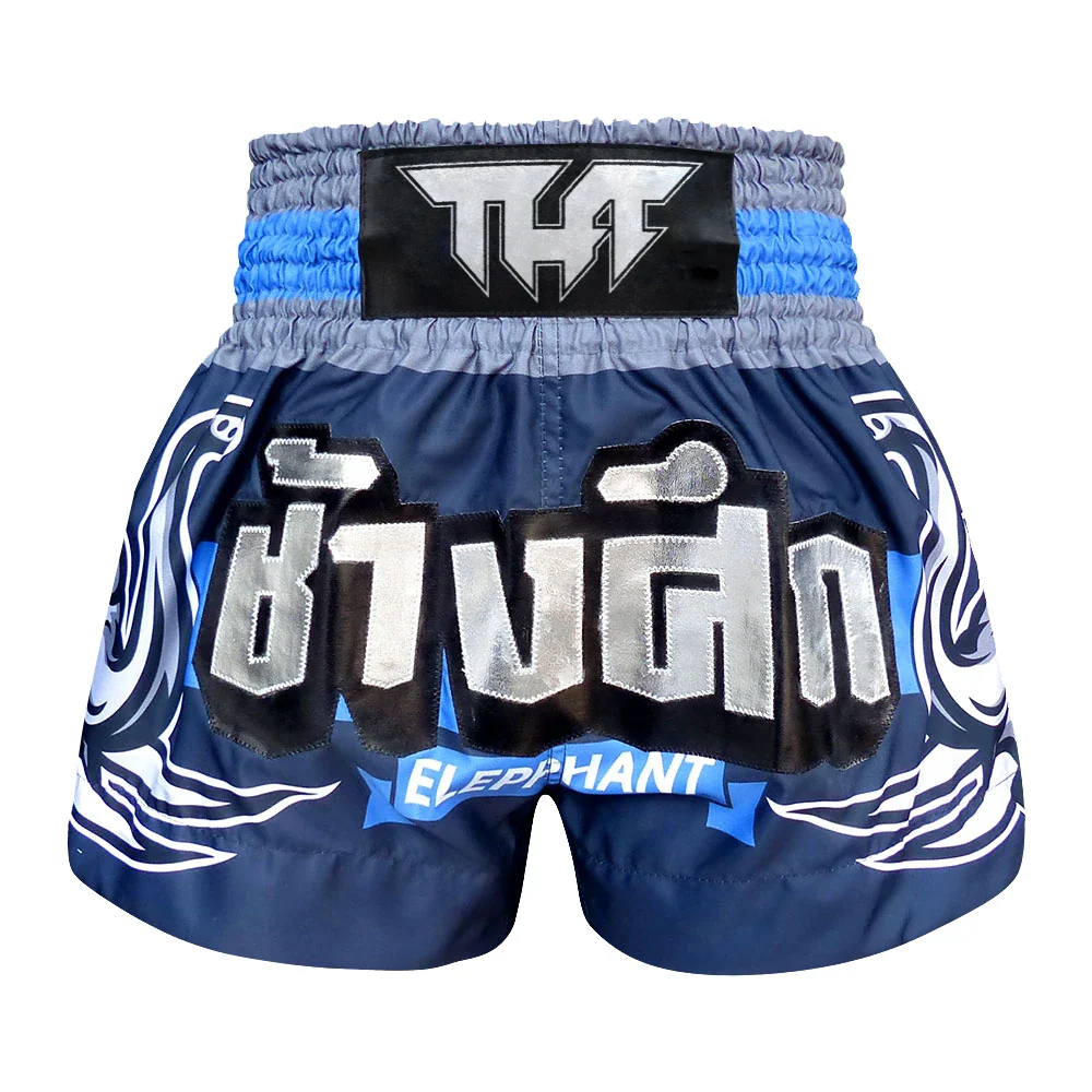 Blue and gray Muay Thai shorts with branding on a white background