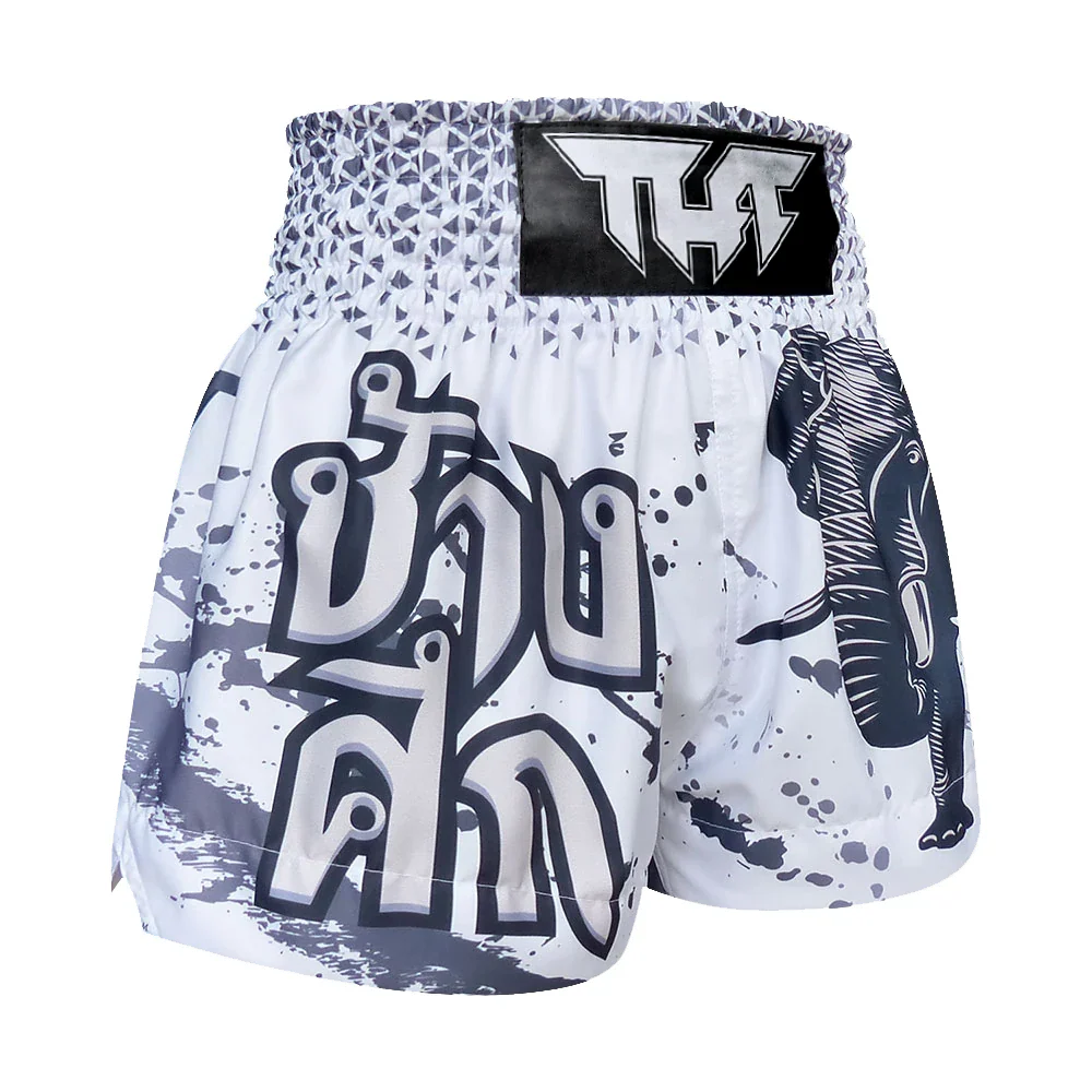White and gray Muay Thai shorts with elephant design and brand logo on a white background