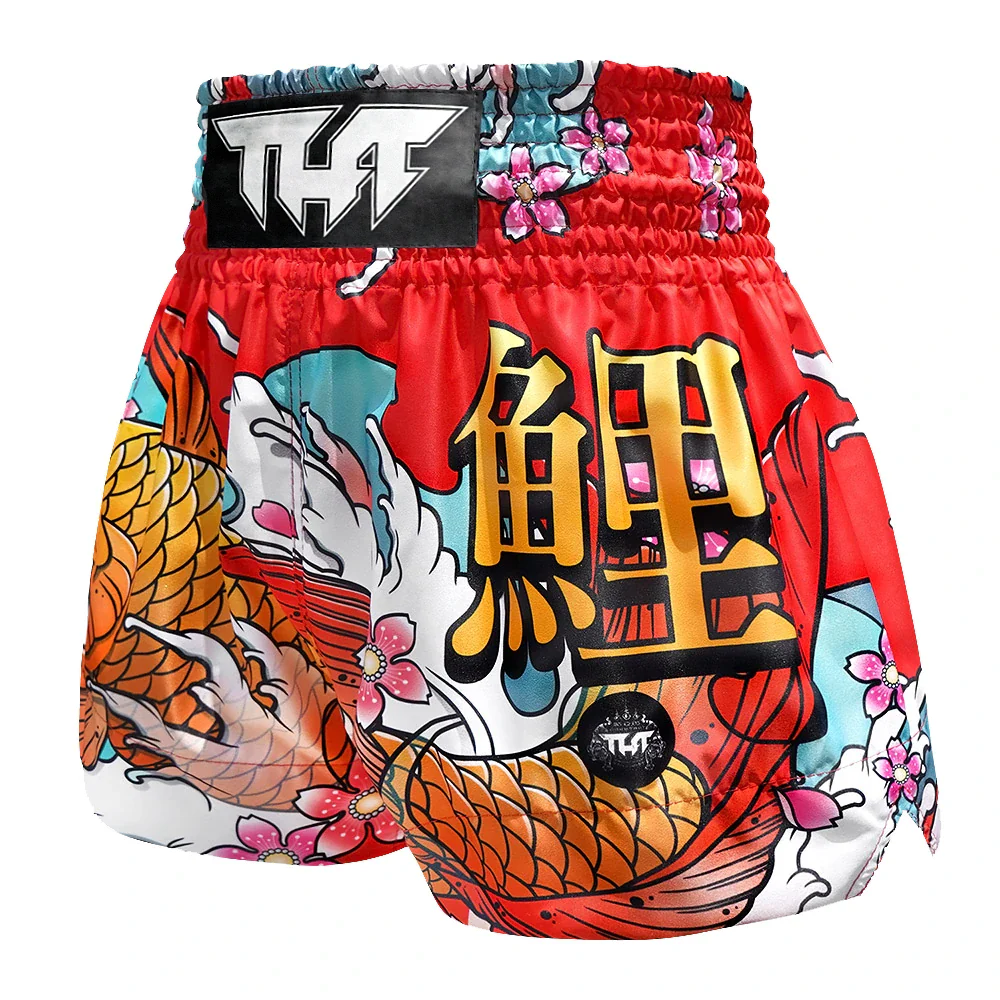 Colorful Muay Thai shorts with koi fish and cherry blossoms design on a white background