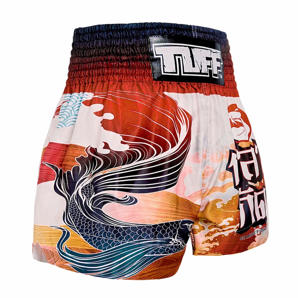 Colorful Muay Thai shorts with wave design and brand logo on a white background