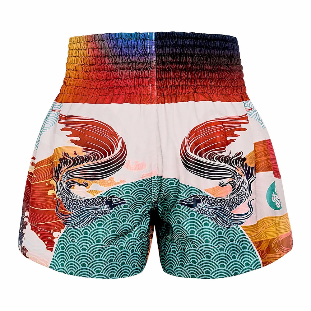 Colorful Muay Thai shorts with dragon design on a white background