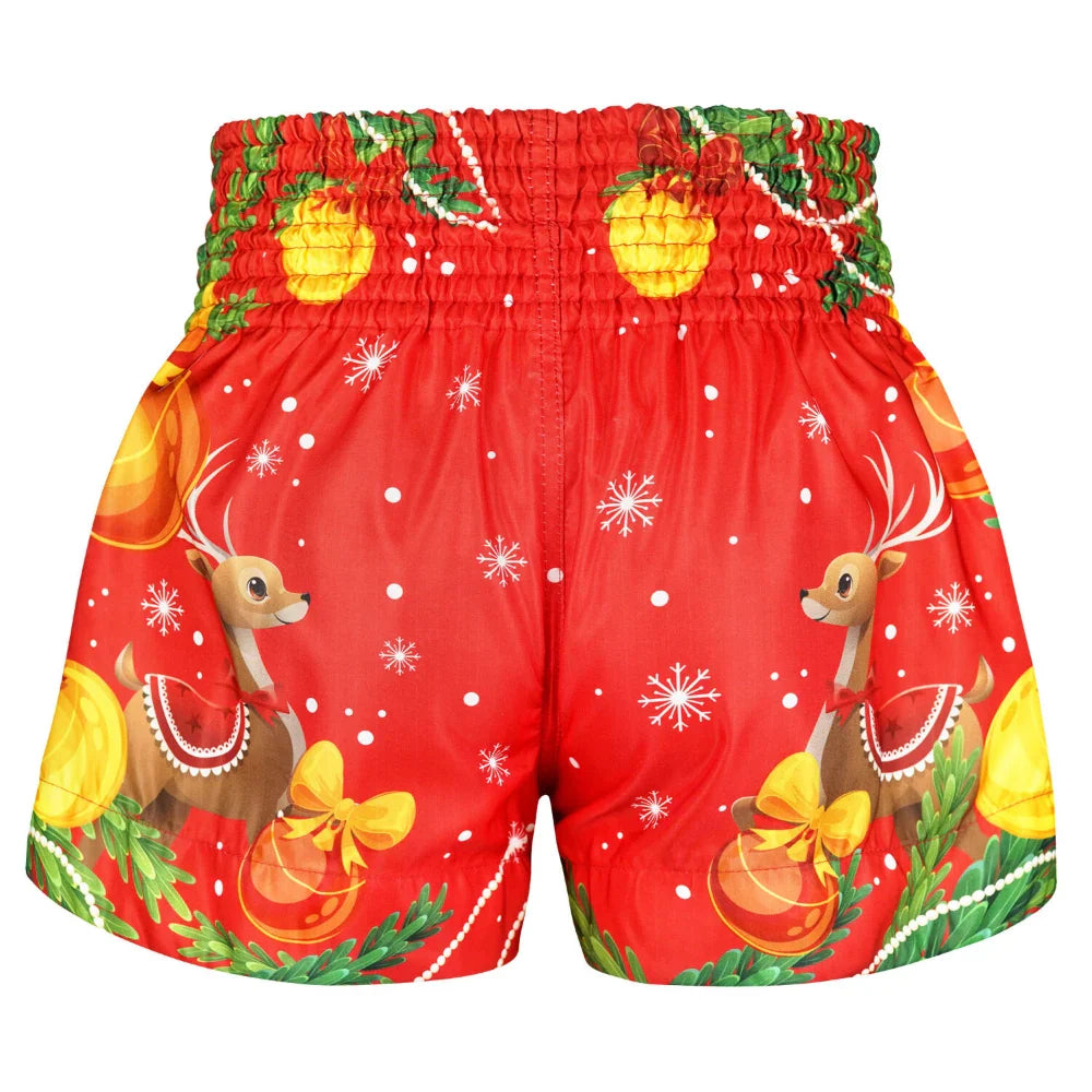 Red Muay Thai shorts with Christmas-themed design featuring reindeer and ornaments on a white background