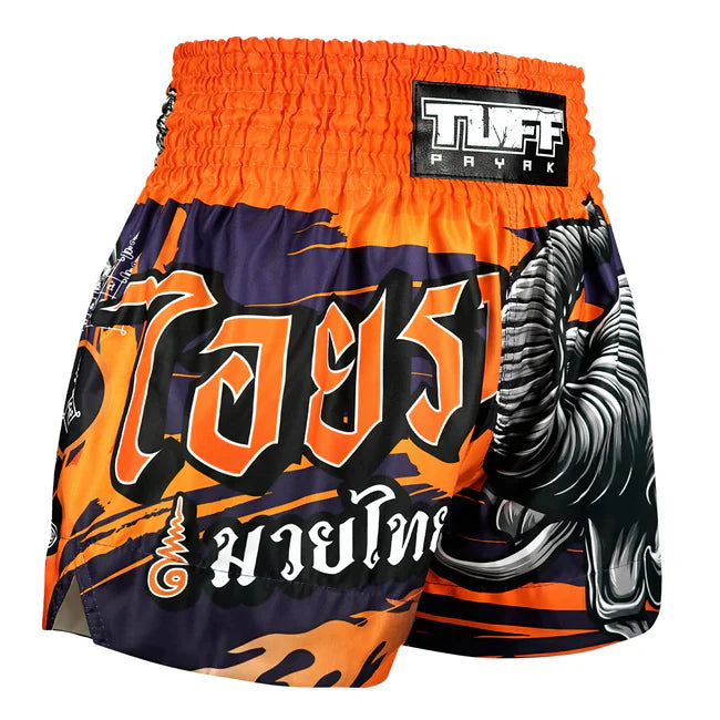 Orange and black Muay Thai shorts with an elephant design on a white background