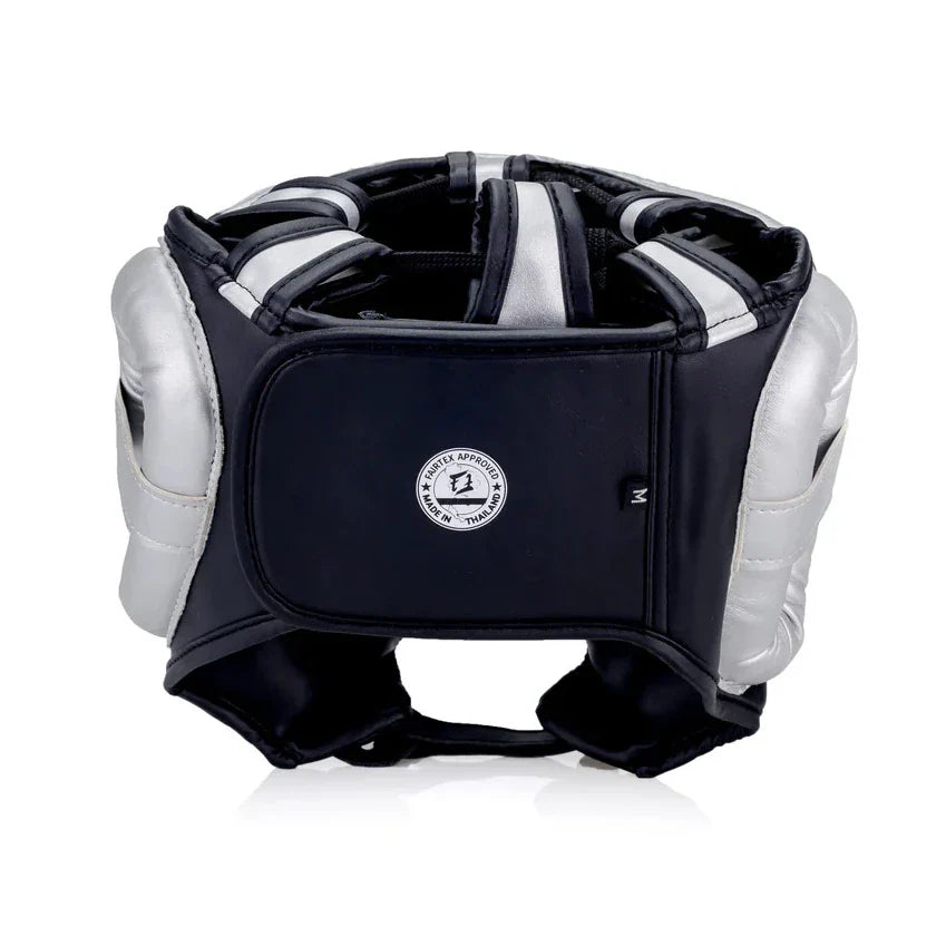 Black and white protective headgear with a brand logo on a white background