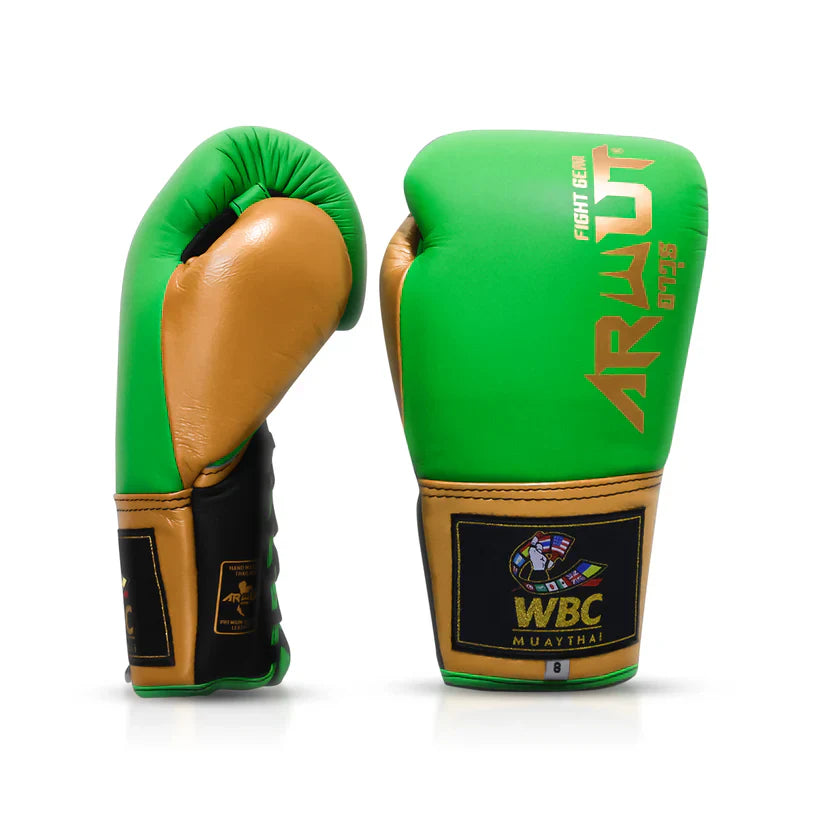 Green and gold boxing gloves with WBC logo on a white background