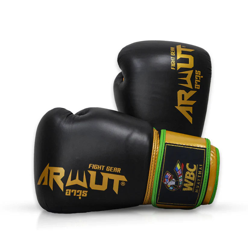 Black boxing gloves with gold and green accents featuring Arwut Fight Gear branding on a white background.