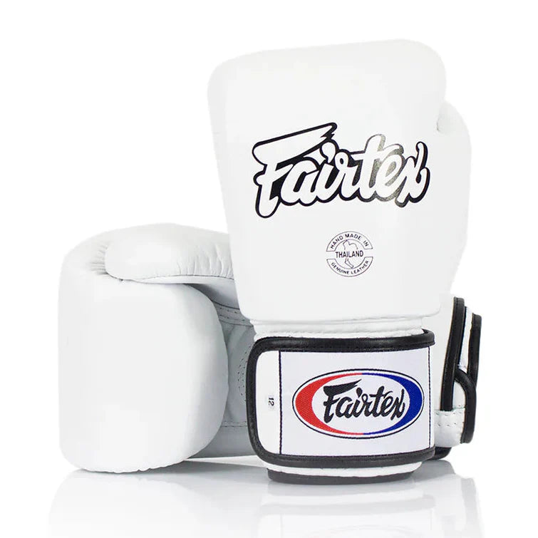 White boxing glove with Fairtex branding on a white background