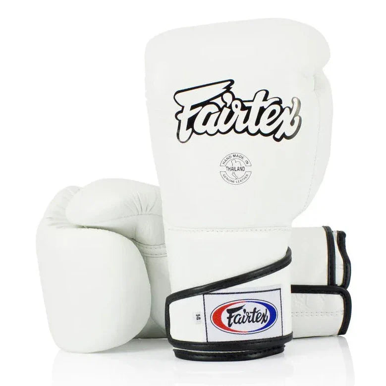 White boxing gloves with Fairtex logo on a white background