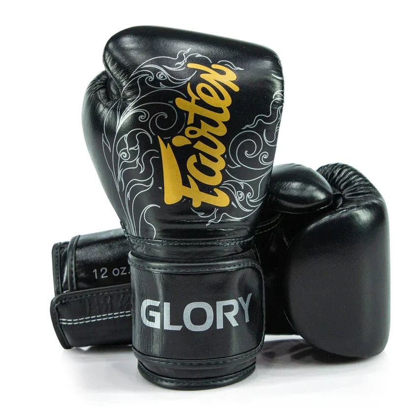 Black boxing gloves with 'Fairtex' and 'Glory' branding on a white background