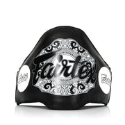 Black belly pad with white decorative patterns and 'Fairtex' branding on a white background