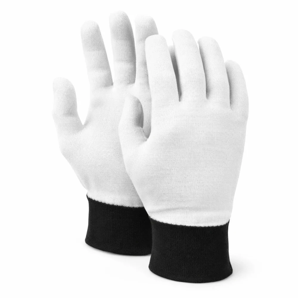 Pair of white boxing inner gloves with black cuffs on a white background