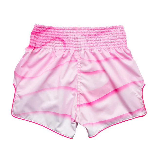 Pink and white Muay Thai shorts with a smocked waistband on a white background