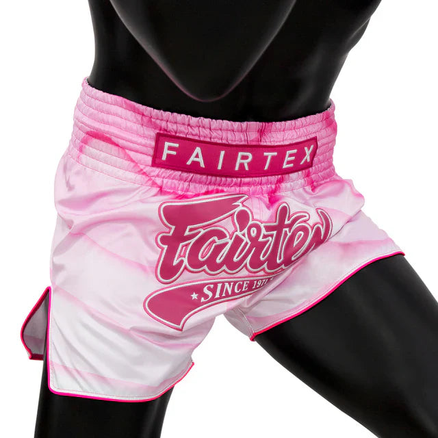 Pink Fairtex Muay Thai shorts on a black mannequin