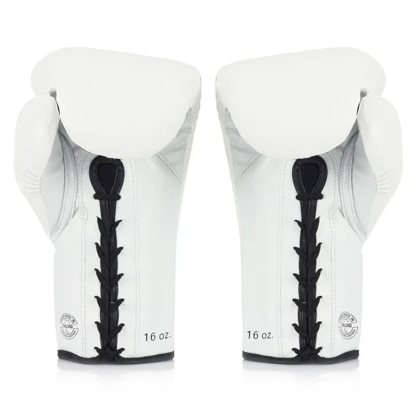 Pair of white boxing gloves with black laces on a white background