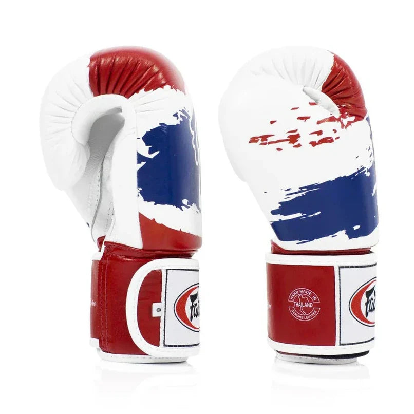 Pair of boxing gloves with red, white, and blue design on a white background