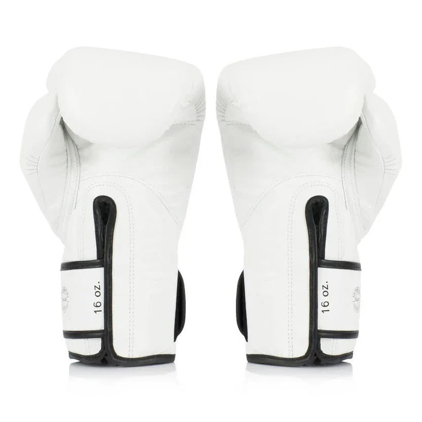 Pair of white boxing gloves with black accents on a white background