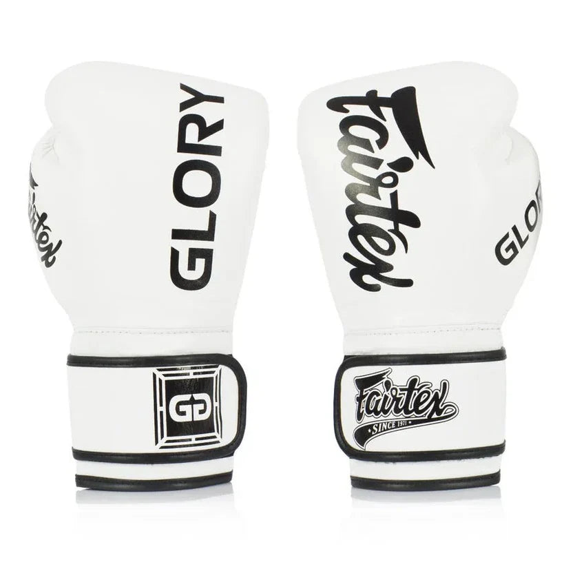Pair of white boxing gloves with black branding on a white background